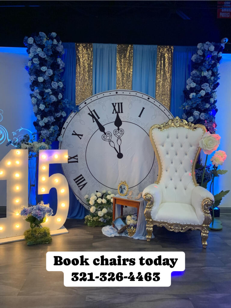Gold and white throne chair at a quinceañera event backdrop